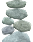 Stack of balanced stones on a white background